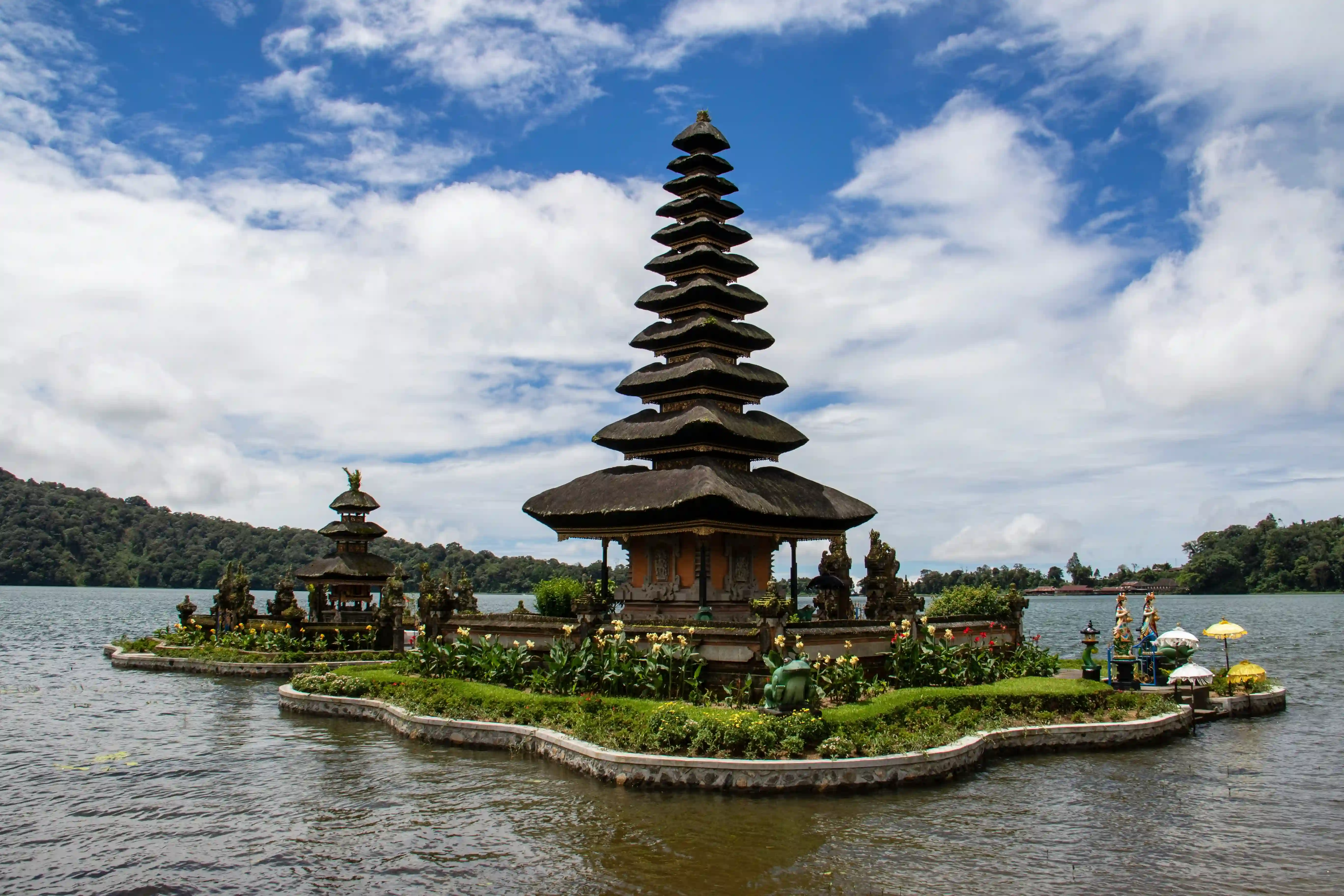 Ulun Danu Beratan temple reflecting in the calm volcanic lake in Bali's highlands